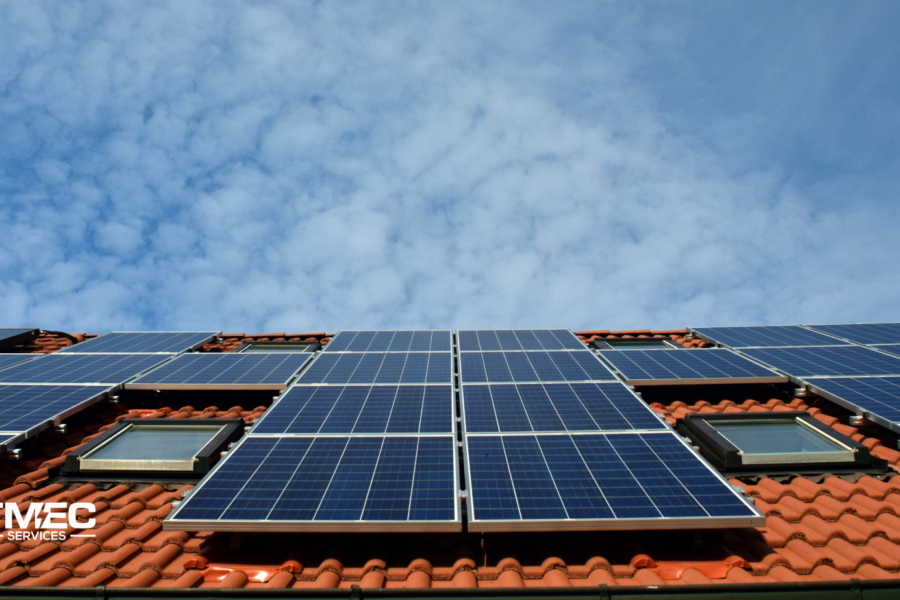 Rooftop solar panels installed on a residential home under a clear blue sky, representing clean energy solutions eligible for the New Federal Solar Battery Rebate in Australia 2025.